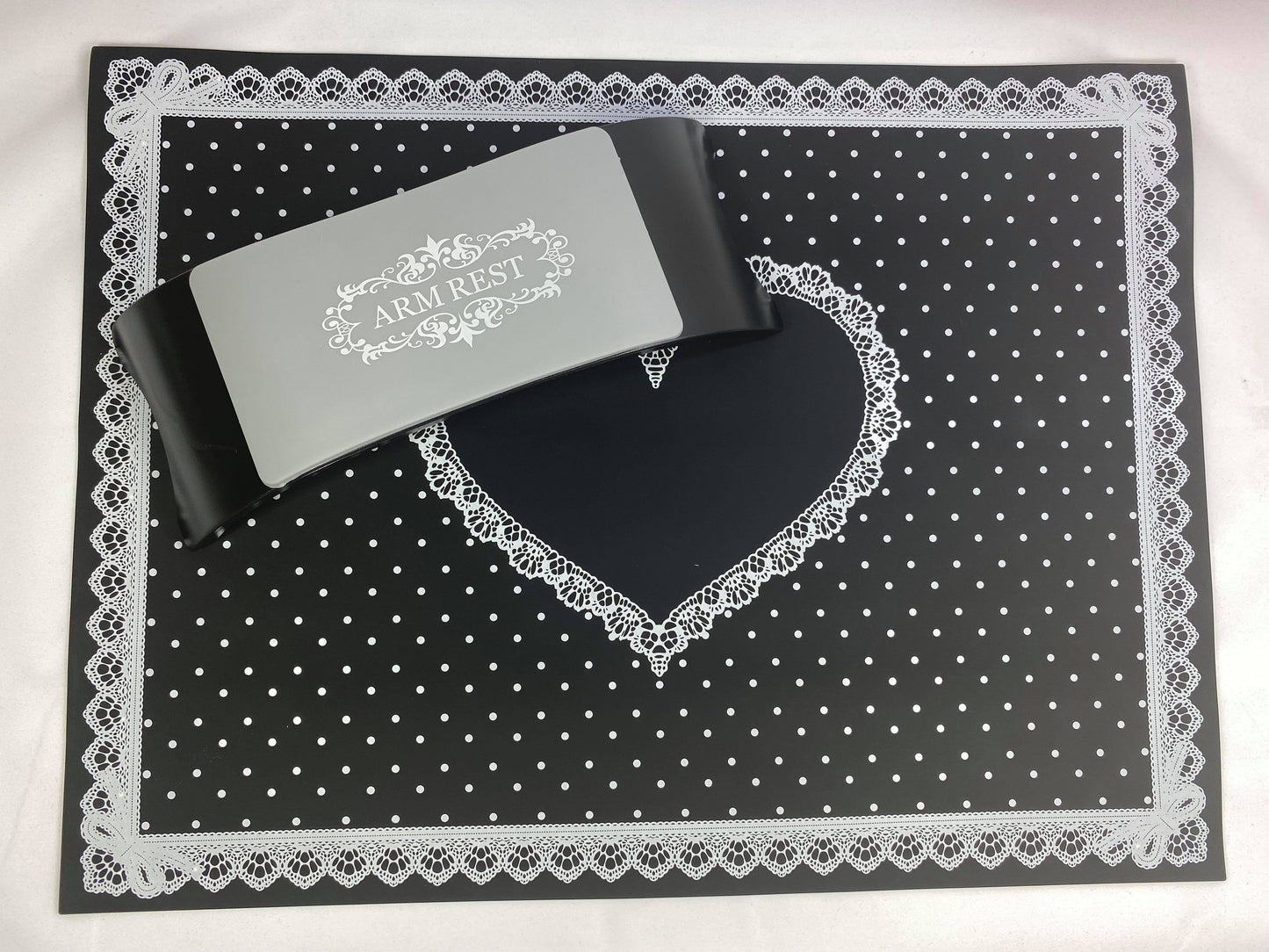 Black arm rest and arm mat