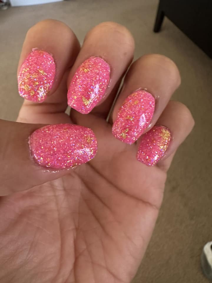 Pink iridescent dip powder with gold foils