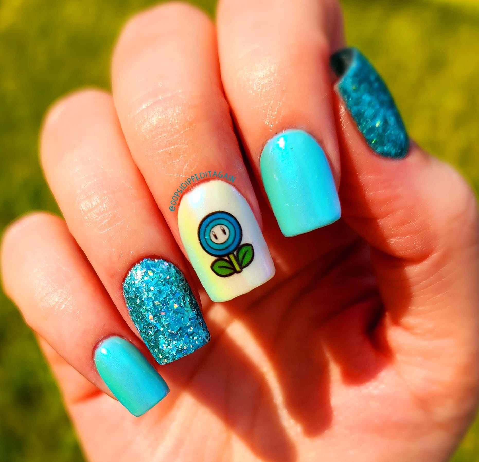 Blue dip powder manicure