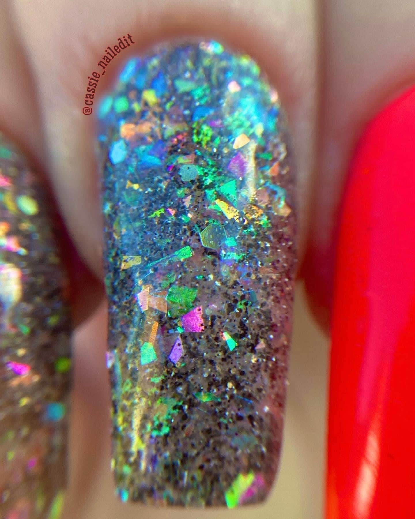 black glitter and multicolored flakes