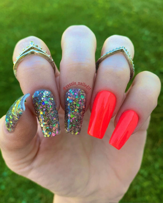 black glitter and multicolored flakes